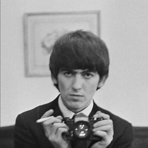 Стикер 😠 из набора The Beatles ::